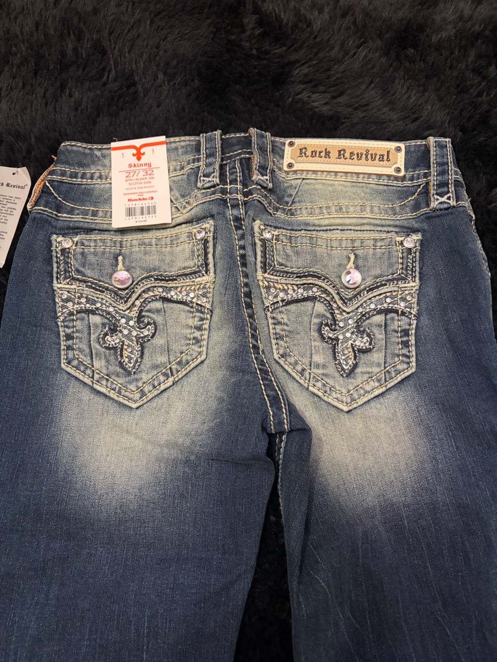 Rock Revival Skinny Jeans in Faded Blue Denim with Rhinestone Pockets